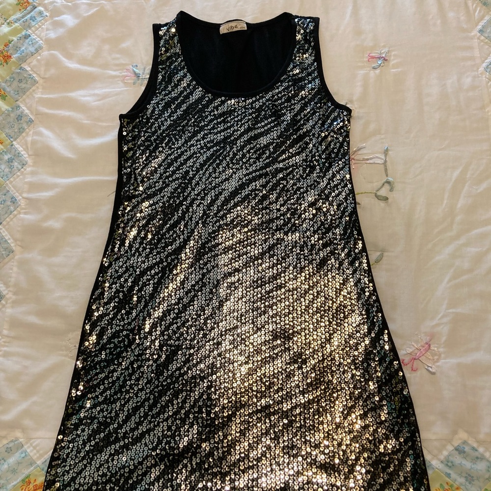 Black with silver sequin vibe dress.